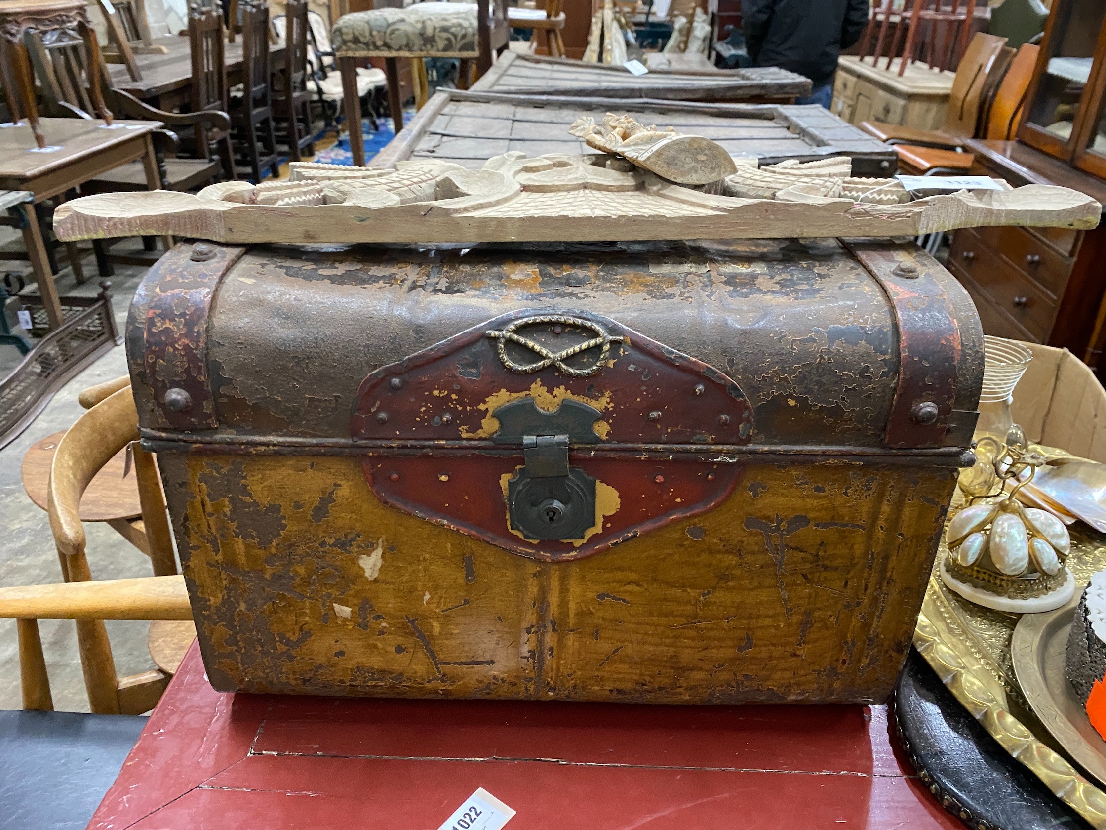 A Victorian tin trunk, a painted leather banner, an oval Indian brass tray and sundries.